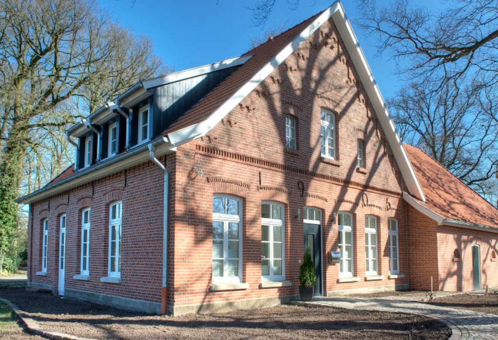 Referenz Haus mit Backstein-Fassade